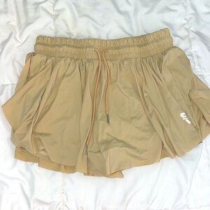 Flowy athletic shorts light brown